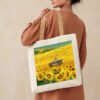 Boat in Sunflower Meadow Canvas Tote