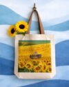Boat in Sunflower Meadow Canvas Tote